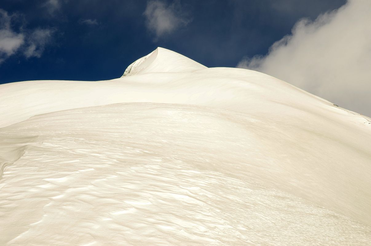 12 Staring Up At The Expansive Snow Field To The Summit Of Chulu Far East From Col Camp 